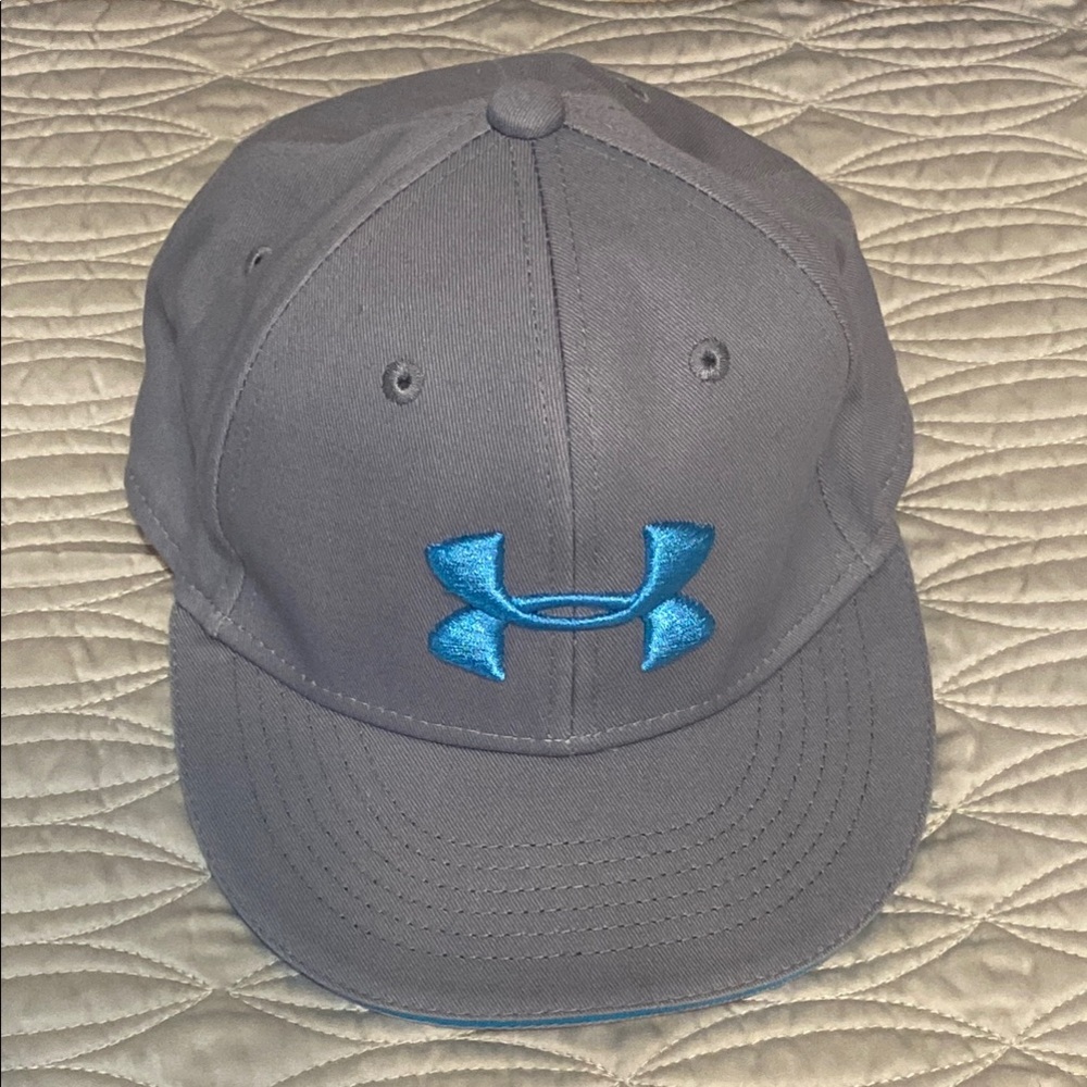 Under Armour Gray ball cap with blue logo, trim and back tab